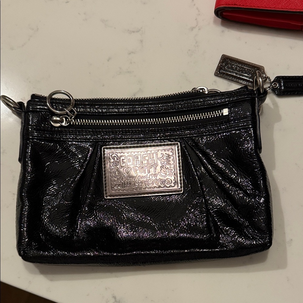Coach Shimmering Black Wristlet with Silver Accents